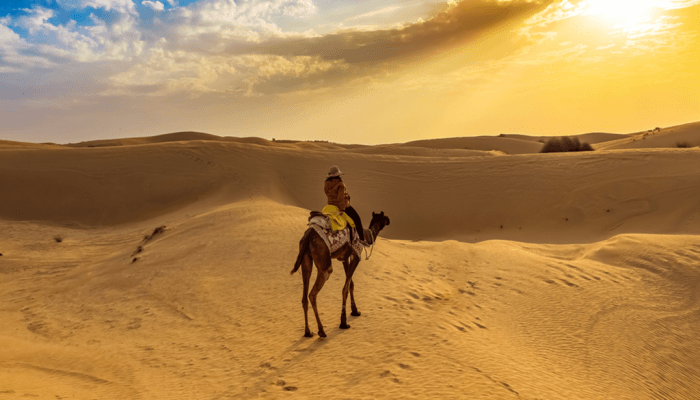 women-riding-camel-alone-at-desert-of-merzouga-best-tour-of-morocco-